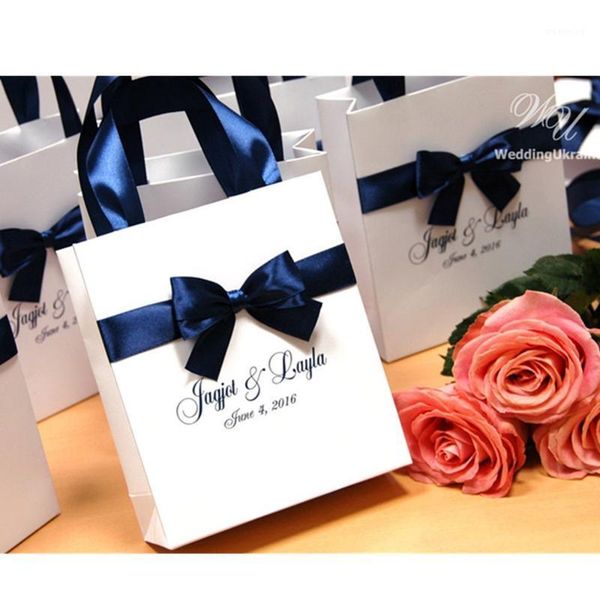 personalized navy wedding gift bags with satin ribbon, bow and names elegant paper bag custom wedding gift bags for1
personalized navy wedding gift bags with satin ribbon, bow and names elegant paper bag custom wedding gift bags for1
