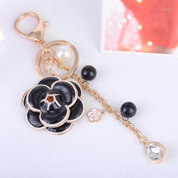 creative fine crystal pearl black white camellia keychain charming lady gift pendant key chain beautiful bag accessories keyring1, Silver
creative fine crystal pearl black white camellia keychain charming lady gift pendant key chain beautiful bag accessories keyring1, Silver