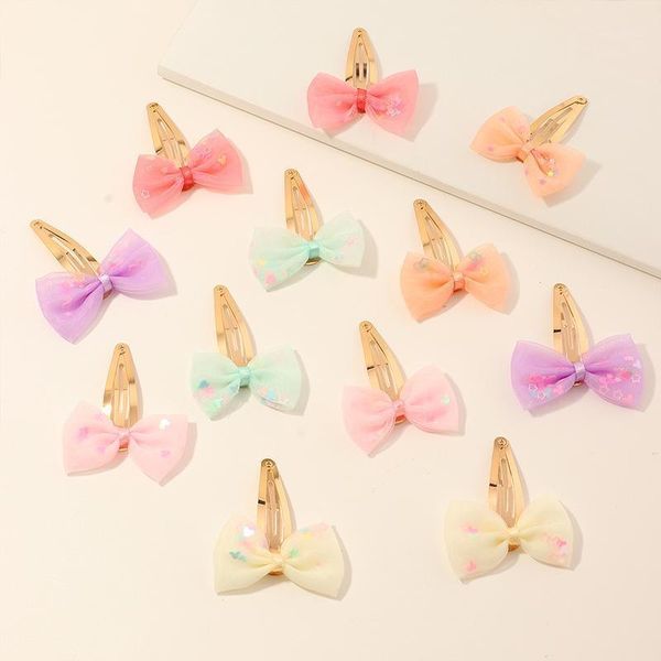 12pcs children's hair clips baby's hair ornaments bundle of lovely bowknot shape small hairpin suit color of the1, Slivery;white
12pcs children's hair clips baby's hair ornaments bundle of lovely bowknot shape small hairpin suit color of the1, Slivery;white