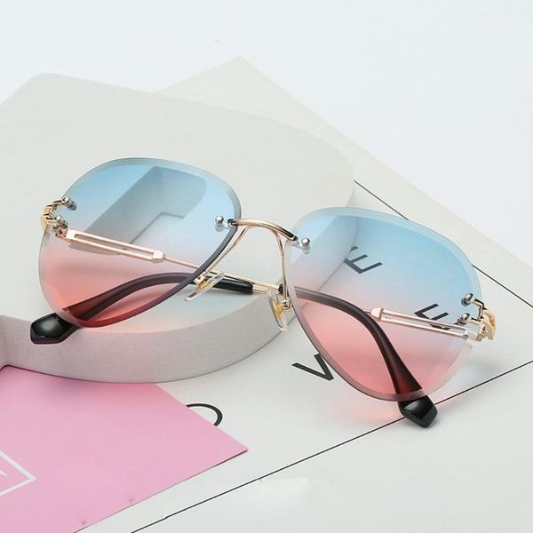uv400 ocean lens shades sunglasses women brand designer rimless sun glasses cutting lens ladies frameless metal eyeglasses1, White;black
uv400 ocean lens shades sunglasses women brand designer rimless sun glasses cutting lens ladies frameless metal eyeglasses1, White;black