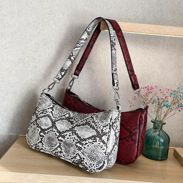 vintage serpentine baguette bag women 2020 pu leather shoulder bag designer snake pattern armpit luxury lady handbag bolso
vintage serpentine baguette bag women 2020 pu leather shoulder bag designer snake pattern armpit luxury lady handbag bolso