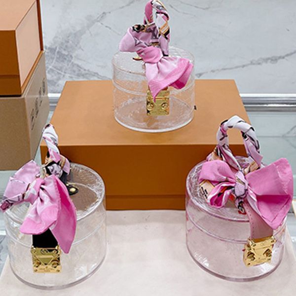 cosmetic bag handbag purse clutch bags fashion transparent pvc gold hardware lock ribbon decoration transparent letter printing women handba
cosmetic bag handbag purse clutch bags fashion transparent pvc gold hardware lock ribbon decoration transparent letter printing women handba