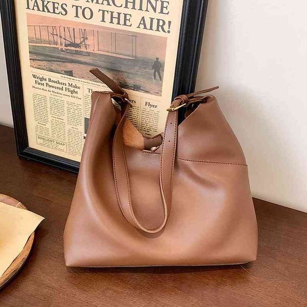 shopping bags minimalism fashion solid color tote bag for women thick leather shoulder purse female shopper black 1 new 220309
shopping bags minimalism fashion solid color tote bag for women thick leather shoulder purse female shopper black 1 new 220309