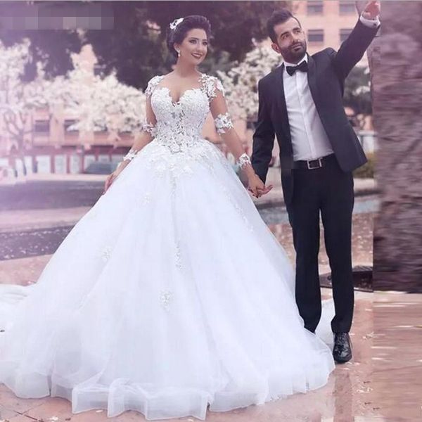 2021 white lace appliques ball gown wedding dresses sheer back illusion long sleeves vestidos de wedding gowns bride dress robe de mariee
2021 white lace appliques ball gown wedding dresses sheer back illusion long sleeves vestidos de wedding gowns bride dress robe de mariee