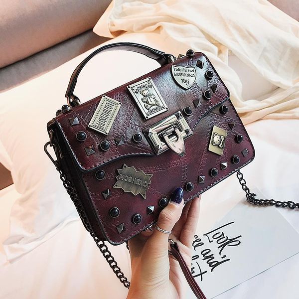 tekiessica fashion vintage sequined rivet chains solid color leather punk women handbag designer shoulder messenger women bags
tekiessica fashion vintage sequined rivet chains solid color leather punk women handbag designer shoulder messenger women bags