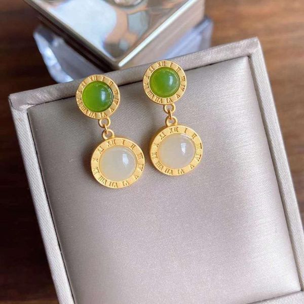 new silver inlaid natural hetian white chalcedony earrings unique ancient gold craft light luxury charm women's brand jewelry
new silver inlaid natural hetian white chalcedony earrings unique ancient gold craft light luxury charm women's brand jewelry
