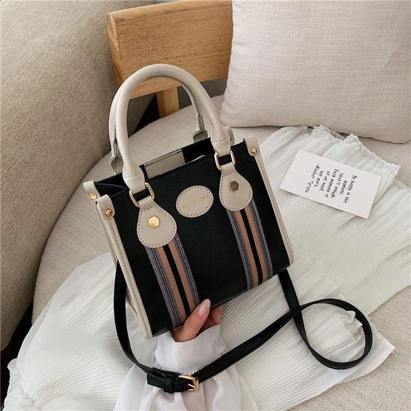 autumn winter women's shoulder bag new striped women's handle bag travel briefcase slung shoulder strap removable
autumn winter women's shoulder bag new striped women's handle bag travel briefcase slung shoulder strap removable