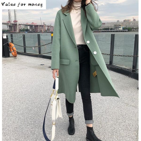 winter new 2020 hepburn double face cashmere coat women's medium and long cocoon loose black woolen coat
winter new 2020 hepburn double face cashmere coat women's medium and long cocoon loose black woolen coat