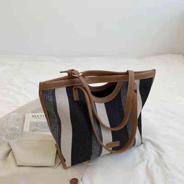 shopping bags ladies fashion canvas large capacitytote bagcasual vertical buckle travel adjustable shoulder strap bag 220309
shopping bags ladies fashion canvas large capacitytote bagcasual vertical buckle travel adjustable shoulder strap bag 220309