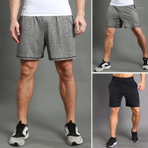 men elastic waistband quick drying pockets gym sports running exercise shorts plus size short men male1, White;black 
men elastic waistband quick drying pockets gym sports running exercise shorts plus size short men male1, White;black