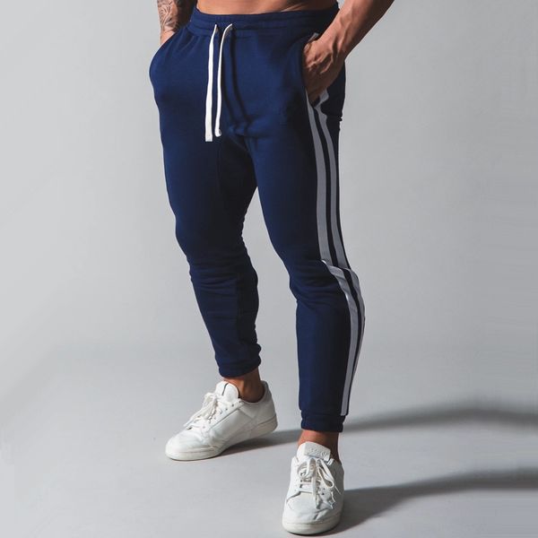 хлопок бегуны брюки мужчины осень бег sweatpants тощий track pants gym fitness training брюки мужской спортивные тренировки днищ, Black;blue
хлопок бегуны брюки мужчины осень бег sweatpants тощий track pants gym fitness training брюки мужской спортивные тренировки днищ, Black;blue