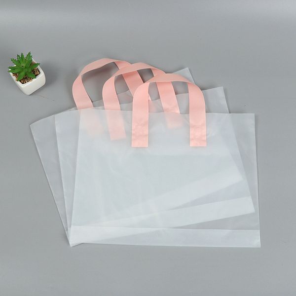 50pcs/pack custom logo transparent clothing bags store plastic gift packaging pe portable boutique shopping bags pink
50pcs/pack custom logo transparent clothing bags store plastic gift packaging pe portable boutique shopping bags pink