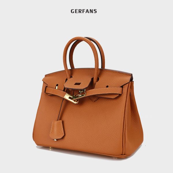 h family litchi pattern women's head leather fashion portable new year's wedding bag
h family litchi pattern women's head leather fashion portable new year's wedding bag
