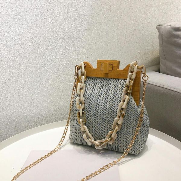 female new luxury acrylic chain women bag fashion straw weave wooden clip bag women's shoulder bags designer small handbag
female new luxury acrylic chain women bag fashion straw weave wooden clip bag women's shoulder bags designer small handbag