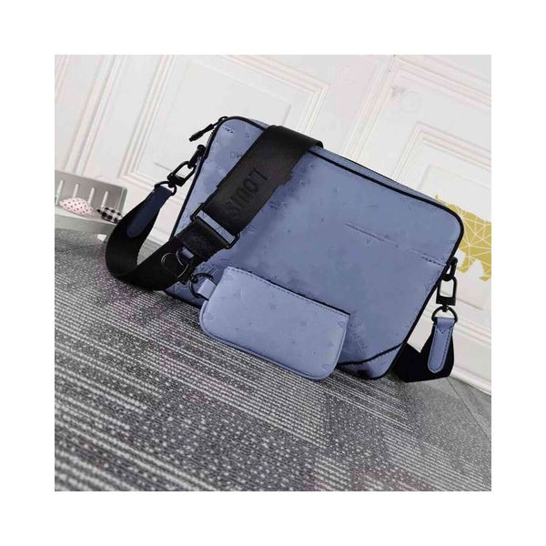 m69827 embossed taigarama leather men's postman bag with spring clasp now has spacious front pocket and double inner pocket
m69827 embossed taigarama leather men's postman bag with spring clasp now has spacious front pocket and double inner pocket