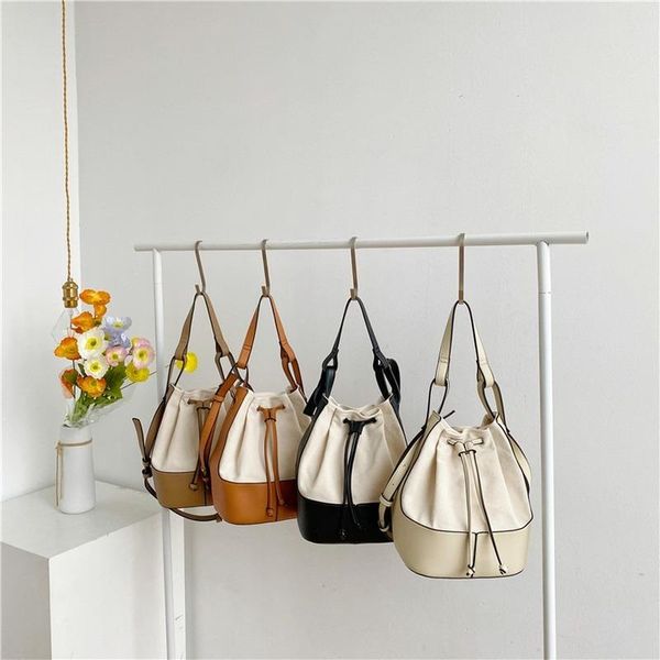 new fashion shoulder bag swomen bags designer personalized stitching canvas portable bucket bag luxury handbag for woman 202
new fashion shoulder bag swomen bags designer personalized stitching canvas portable bucket bag luxury handbag for woman 202