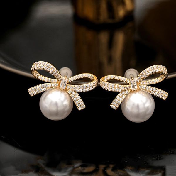 simple statement pearl bowknot stud earring 2021 new fashion cubic zirconia short earings luxury wedding jewelry for women, Silver
simple statement pearl bowknot stud earring 2021 new fashion cubic zirconia short earings luxury wedding jewelry for women, Silver
