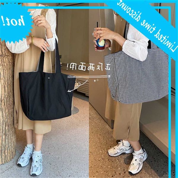 08253 japanese and korean simple fresh check double-sided shoulder student female leisure large capacity dual-purpose bag
08253 japanese and korean simple fresh check double-sided shoulder student female leisure large capacity dual-purpose bag