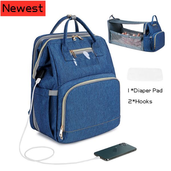 mother diaper with bed for mummy usb baby care backpack multifunction waterproof maternity bag mommy stroller bags 1005
mother diaper with bed for mummy usb baby care backpack multifunction waterproof maternity bag mommy stroller bags 1005