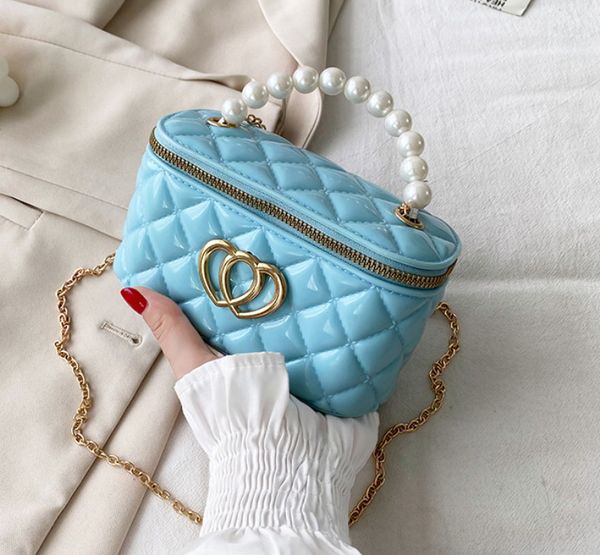 summer new fashion mini chain pearl bucket jelly handbag shoulder messenger portable female bag cosmetic coin purse, Red;black
summer new fashion mini chain pearl bucket jelly handbag shoulder messenger portable female bag cosmetic coin purse, Red;black