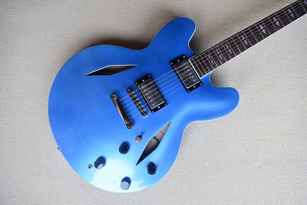 factory custom semi-hollow metallic blue electric guitar with fixed bridge,rosewood fretboard with white binding,can be customized
factory custom semi-hollow metallic blue electric guitar with fixed bridge,rosewood fretboard with white binding,can be customized