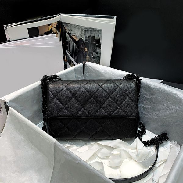 patterned jacquard luggage bag black grained bovine leather detachable adjustable shoulder strap secured to the side with a halo clip
patterned jacquard luggage bag black grained bovine leather detachable adjustable shoulder strap secured to the side with a halo clip