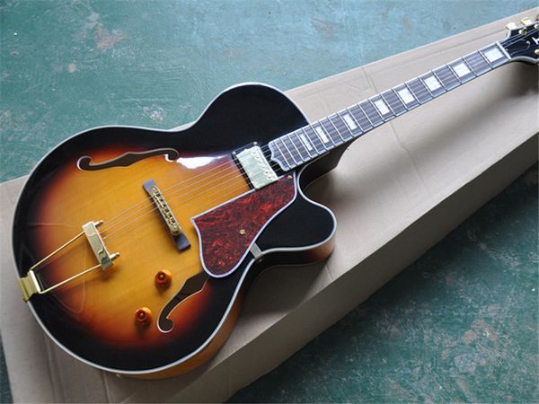 semi hollow jazz electric guitar,tobacco and golden hardware,red pearl pickguard and hh pickups,can be customized to change as required
semi hollow jazz electric guitar,tobacco and golden hardware,red pearl pickguard and hh pickups,can be customized to change as required