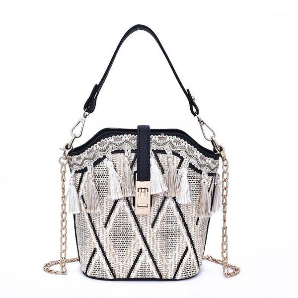 storage bag female fashion new straw woven bag bucket personalized tassel decoration messenger shoulder portable female1
storage bag female fashion new straw woven bag bucket personalized tassel decoration messenger shoulder portable female1