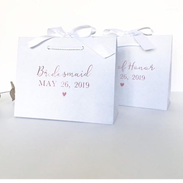personalised white gift bag with ribbon.white bridesmaid gift bag. gold name flower girl bag rose gold bridal party gifts.1
personalised white gift bag with ribbon.white bridesmaid gift bag. gold name flower girl bag rose gold bridal party gifts.1