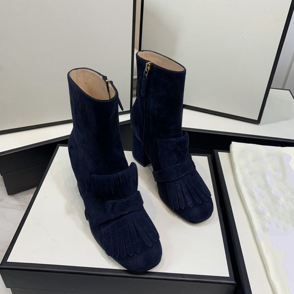 the new boots of 2021 are shoes with letter-embellished heels by luxury designers gera;her, Black