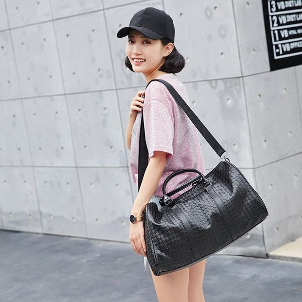 new travel bag ladies handbag large capacity waterproof fitness bag female sports luggage1
new travel bag ladies handbag large capacity waterproof fitness bag female sports luggage1