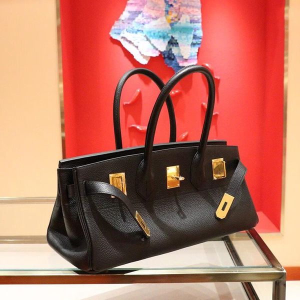 new autumn and winter new fashionable leather horizontal birkin bag underarm bag large capacity litchi grain cowhide handbags for women no, Black;red
new autumn and winter new fashionable leather horizontal birkin bag underarm bag large capacity litchi grain cowhide handbags for women no, Black;red