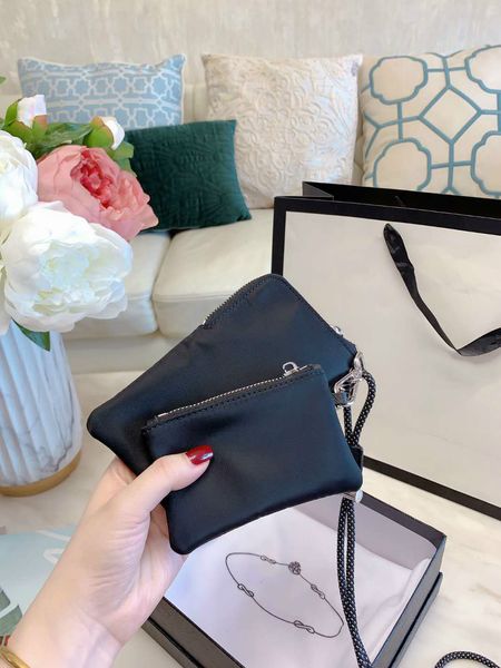 2020 women designer's crossbody bags fashion change bag black shoulder phone bags 2-piece mini size bags pd20100404
2020 women designer's crossbody bags fashion change bag black shoulder phone bags 2-piece mini size bags pd20100404