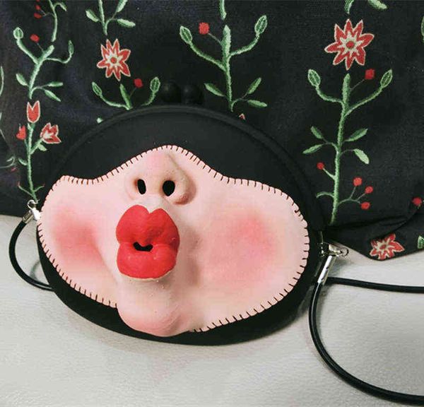shopping bags personality design red lipstick face shoulder cute women silica gel crossbody summer small jelly handbag party purse 220304
shopping bags personality design red lipstick face shoulder cute women silica gel crossbody summer small jelly handbag party purse 220304