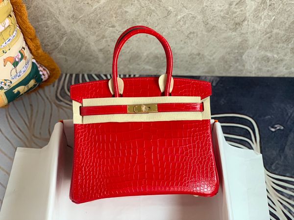 whosale handmade calf skin with crocodile grain design handbag25,30cm,wax stitching,red,black,brown colors,fast delivery
whosale handmade calf skin with crocodile grain design handbag25,30cm,wax stitching,red,black,brown colors,fast delivery