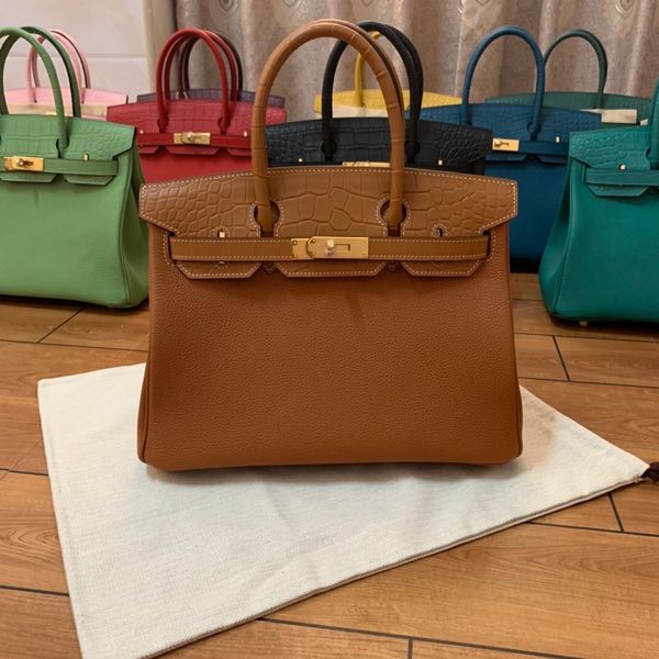 whosale handmade calf skin with crocodile grain+togol leather design handbag30cm,wax stitching,brown green blue 3colors,fast delivery
whosale handmade calf skin with crocodile grain+togol leather design handbag30cm,wax stitching,brown green blue 3colors,fast delivery
