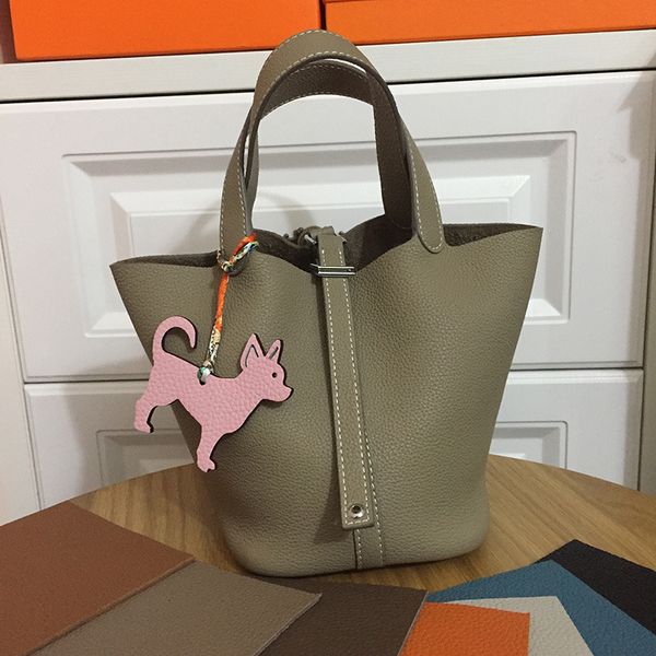 fashion lady carrying head layer cow leather bucket handbag feel wonderful togo skin sweet vegetable basket bag
fashion lady carrying head layer cow leather bucket handbag feel wonderful togo skin sweet vegetable basket bag