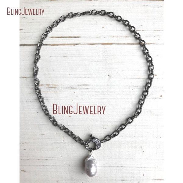 pave crystal clasp choker with gray freshwater baroque pearl pendant on gunmetal texturized chain nm18362, Golden;silver
pave crystal clasp choker with gray freshwater baroque pearl pendant on gunmetal texturized chain nm18362, Golden;silver