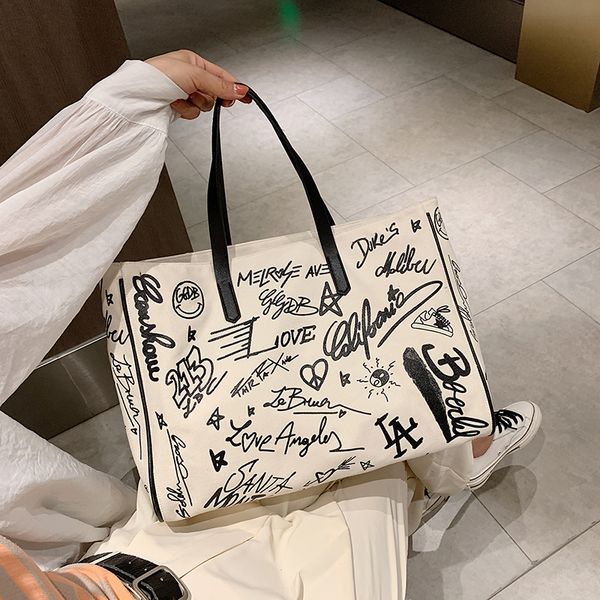 casual graffiti canvas large capacity totes designer handbags lady shoulder crossbody bags female big purses shopper bag 2020 c1016
casual graffiti canvas large capacity totes designer handbags lady shoulder crossbody bags female big purses shopper bag 2020 c1016