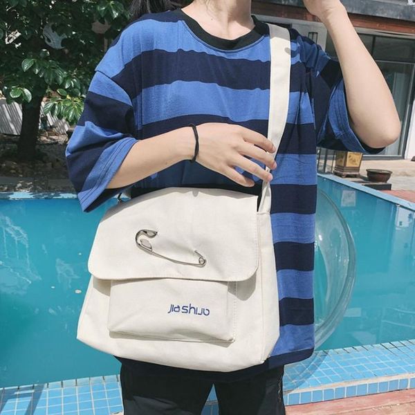 embroidered canvas totes handbag 2020 new portable original shoulder messenger bag simple japanese literary flap school book bag 
embroidered canvas totes handbag 2020 new portable original shoulder messenger bag simple japanese literary flap school book bag