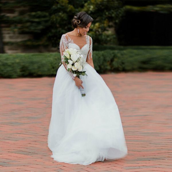 white tulle long sleeve beading bateau backless wedding dress vestidos de novia a-line with brush train wedding gowns
white tulle long sleeve beading bateau backless wedding dress vestidos de novia a-line with brush train wedding gowns