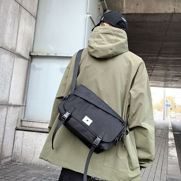 multifunctional shoulder messenger bag with reflective streetwear strip waterproof travel handbag large capacity storage bag c1026
multifunctional shoulder messenger bag with reflective streetwear strip waterproof travel handbag large capacity storage bag c1026