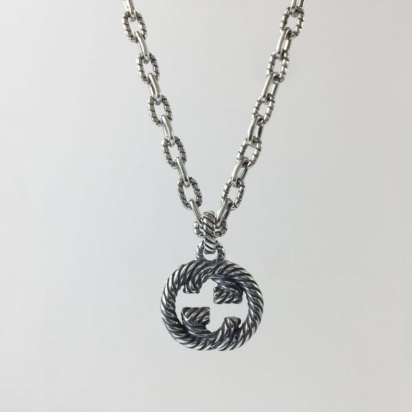 double twisted pattern interlocking ring sterling 925 silver fashion men and women necklace 1:1
double twisted pattern interlocking ring sterling 925 silver fashion men and women necklace 1:1