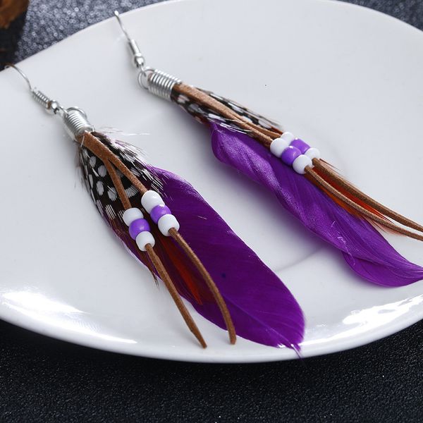 factory price silver color feather beads for bohemian women party catwalk hanging earrings boucles colorful fea
factory price silver color feather beads for bohemian women party catwalk hanging earrings boucles colorful fea