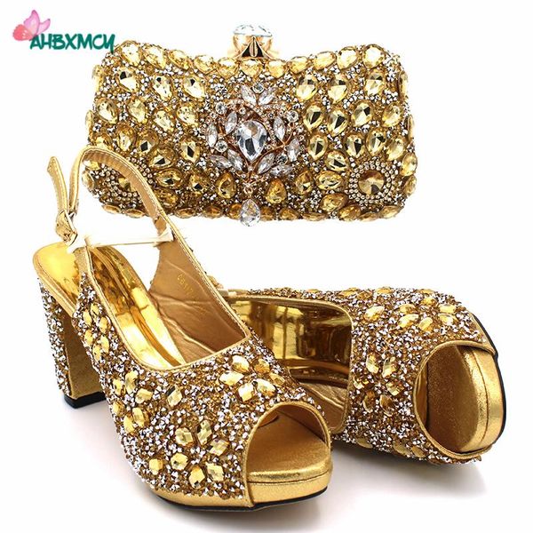 golden color new design african women shoes matching bag set in heels with shinning crystal for royal party, Black
golden color new design african women shoes matching bag set in heels with shinning crystal for royal party, Black