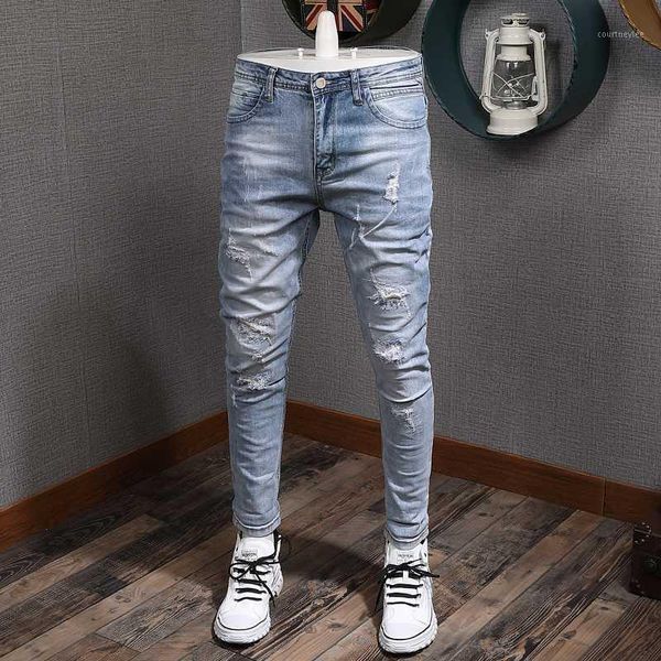 light blue washed hole jeans men's fashion brand slim fit elastic feet korean style men's pants jean homme slim moda hombre 20201
light blue washed hole jeans men's fashion brand slim fit elastic feet korean style men's pants jean homme slim moda hombre 20201