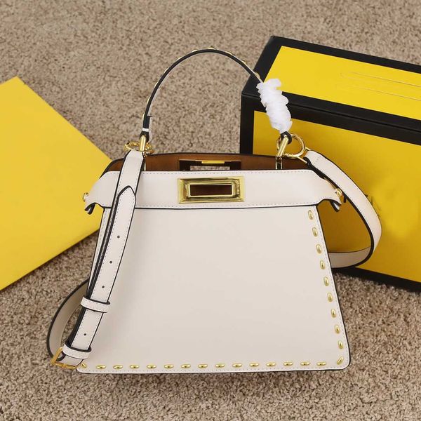 luxury designer messenger bag leather trapezoidal profile rivet square lock handbag
luxury designer messenger bag leather trapezoidal profile rivet square lock handbag