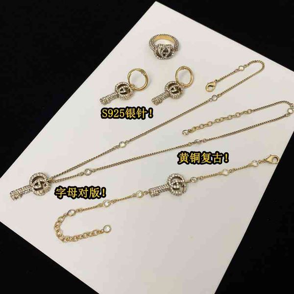 factory wholesale letter earrings female ancient brass key pendant bracelet necklace ring jewelry set, Golden
factory wholesale letter earrings female ancient brass key pendant bracelet necklace ring jewelry set, Golden