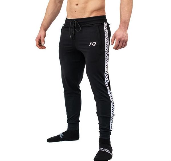 running pants men's jogging slim 2021 bodybuilding leggings sports male gym fitness training trousers, Black;blue
running pants men's jogging slim 2021 bodybuilding leggings sports male gym fitness training trousers, Black;blue