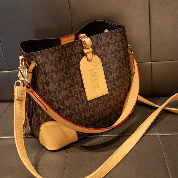 brand luxury design single shoulder messenger bag 2022 niche retro print alphabet bucket bag personality color matching handbag
brand luxury design single shoulder messenger bag 2022 niche retro print alphabet bucket bag personality color matching handbag